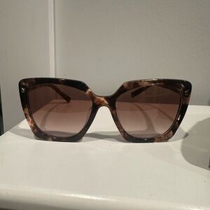 Prada Tortoise Shell Sunglasses